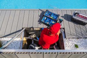 swimming-pool-maintenance-worker-resize-1.jpg